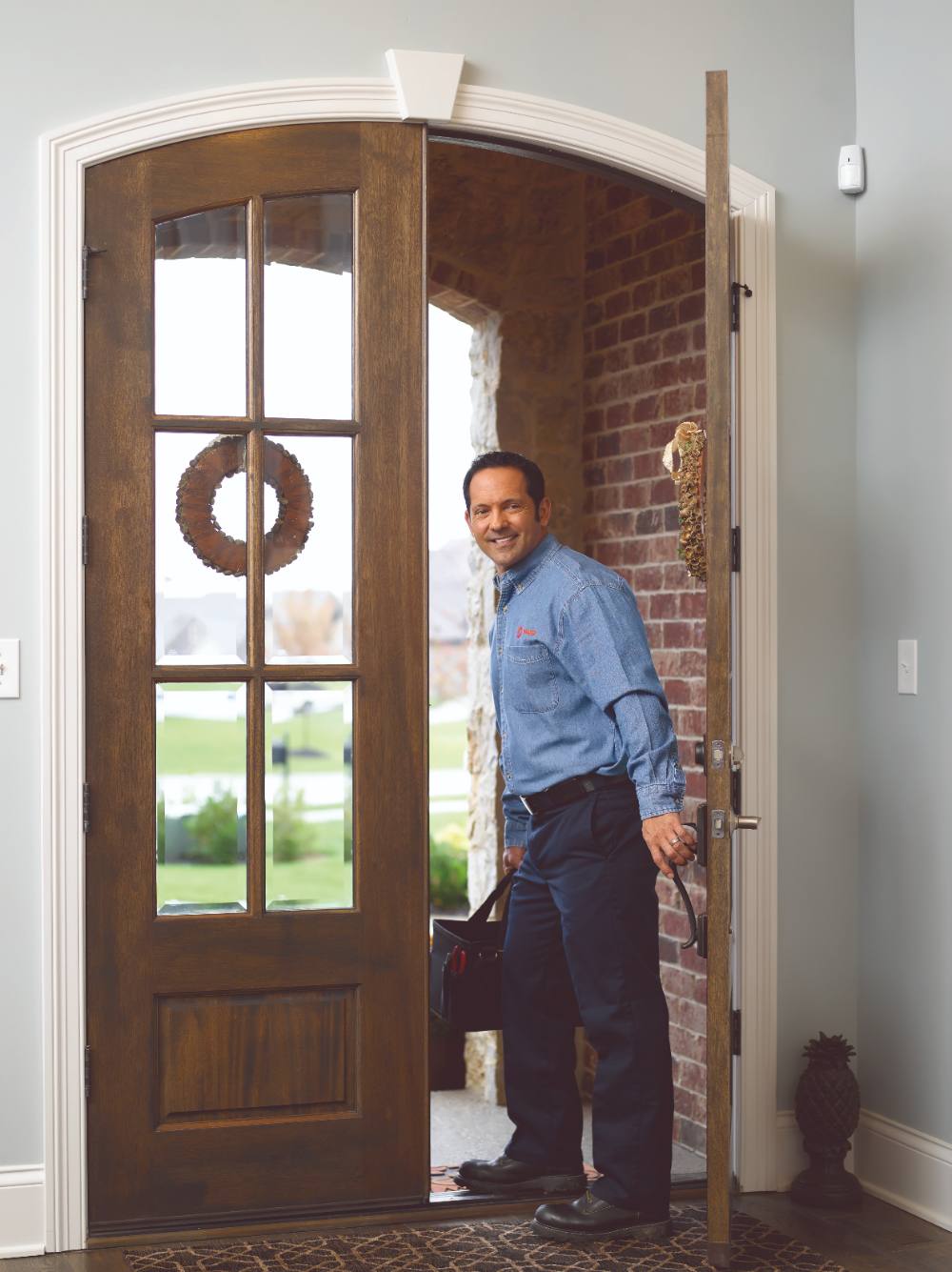 Hvac Technician Leaving A Home
